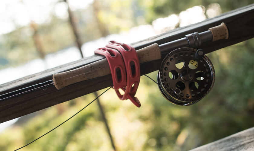fishing equipment tied down with a strap